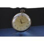 A large desk top glass ball clock.