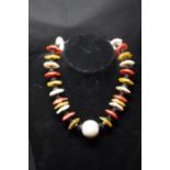 An ethnic beaded necklace.