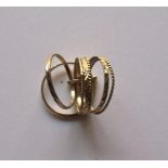 Gouden ring bestaande uit 7x kleinere ringetjes, maat 16