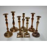 7x Koperen kandelaars,h. ca 24cm 7 Candlesticks in copper, h. ca 24cm