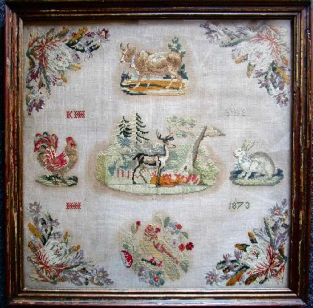 Merklap anno 1873, ingelijst, 65x65cm Sampler anno 1873, in frame 65x65cm