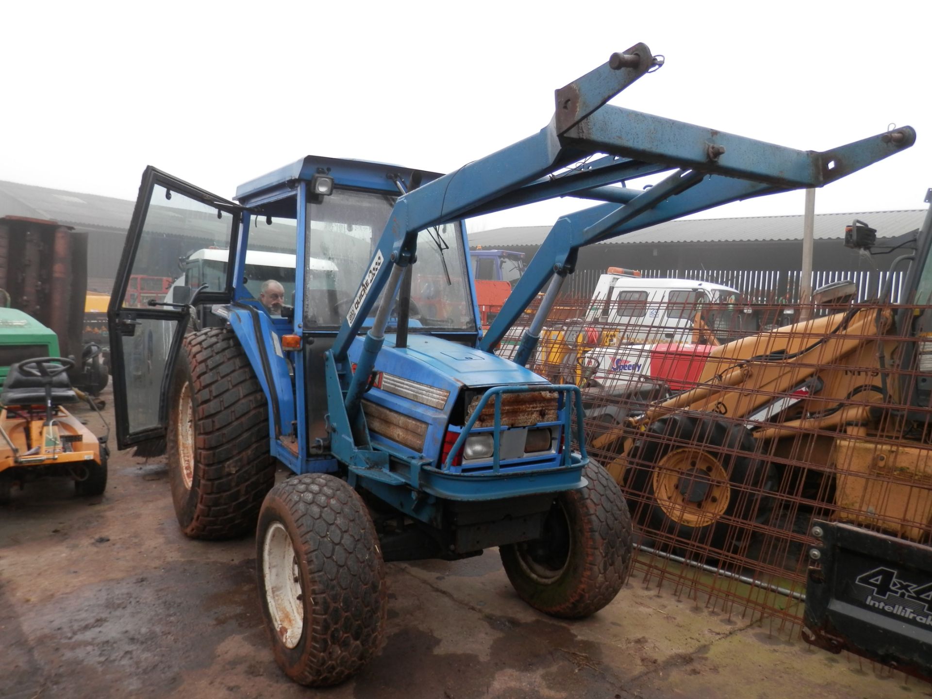 ISEKI 545 TRACTOR WITH FRONT LOADER. GOOD WORKING UNIT.