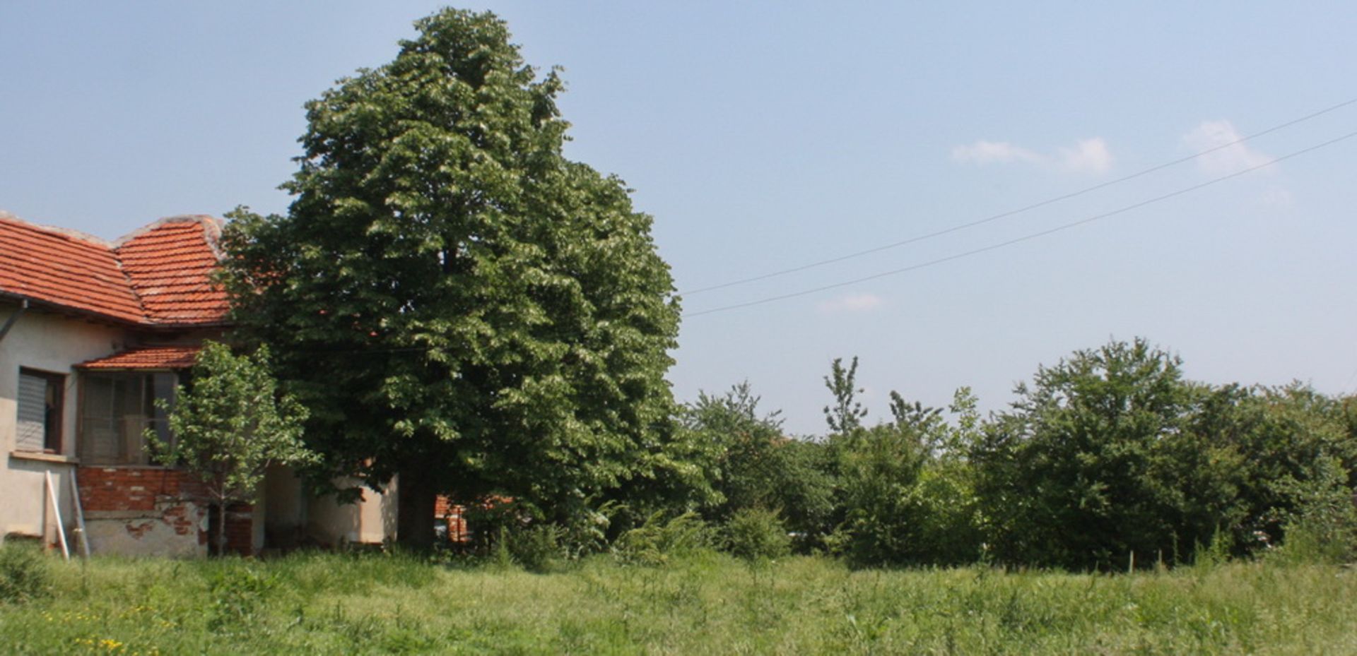 NICE HOUSE, OVER 1/2 ACRE BOROVAN + TWO OUTBUILDINGS AND 2,400 SQM OF LAND BULGARIA - Image 7 of 30