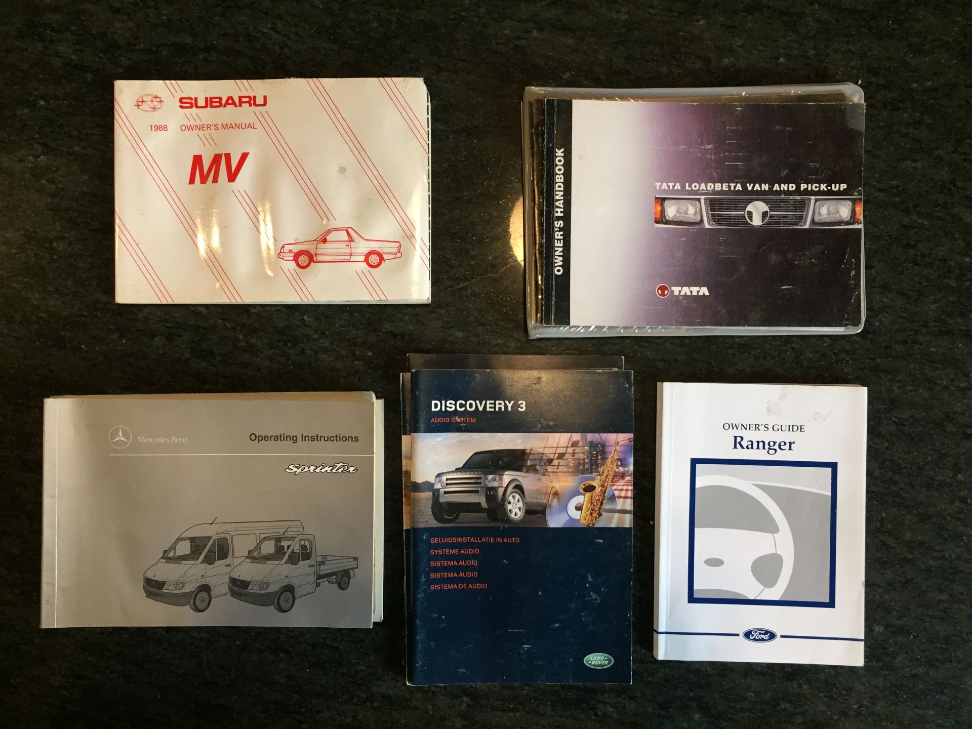 5 OWNERS MANUALS DISCOVERY 3 AUDIO MANUAL , MERC SPRINTER, SUBARU MV, TATA LOADBETA VAN AND PICK