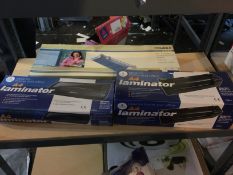 2 X A4 LAMINATORS AND 1 X CUTTER  2 X A4 LAMINATORS IDEAL FOR HOME OR OFFICE  NOT TESTED  OUR REF