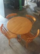 SOLID PINE ROUND DINING TABLE AND FOUR CHAIRS  BEEN IN THE SAME HOUSE SINCE NEW  GOOD CONDITION WITH