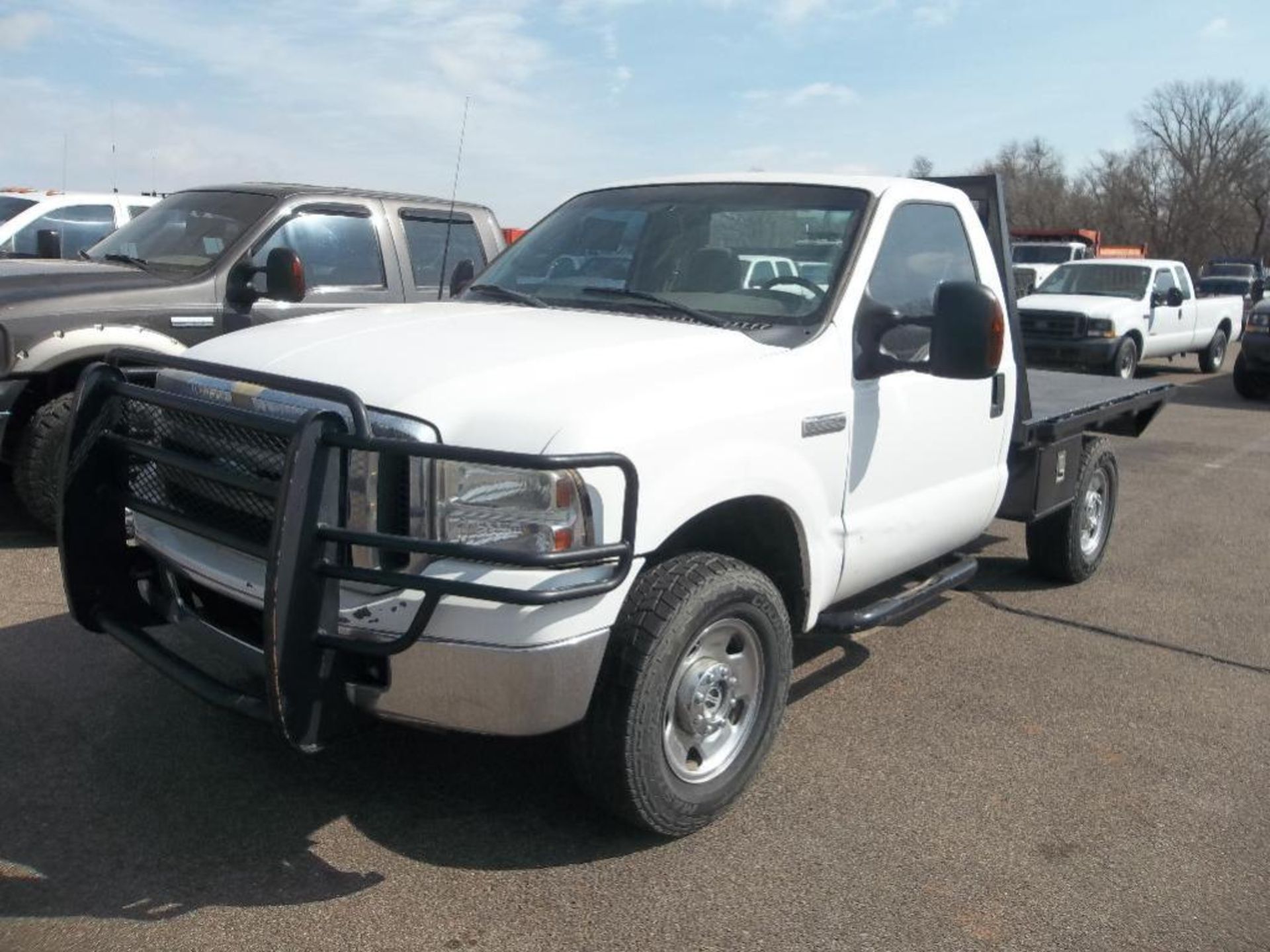 2005 Ford F250 4x4 Flatbed Pickup s/n 1ftnf215x5ed29244, v8 eng, auto trans, od reads 263724 miles,