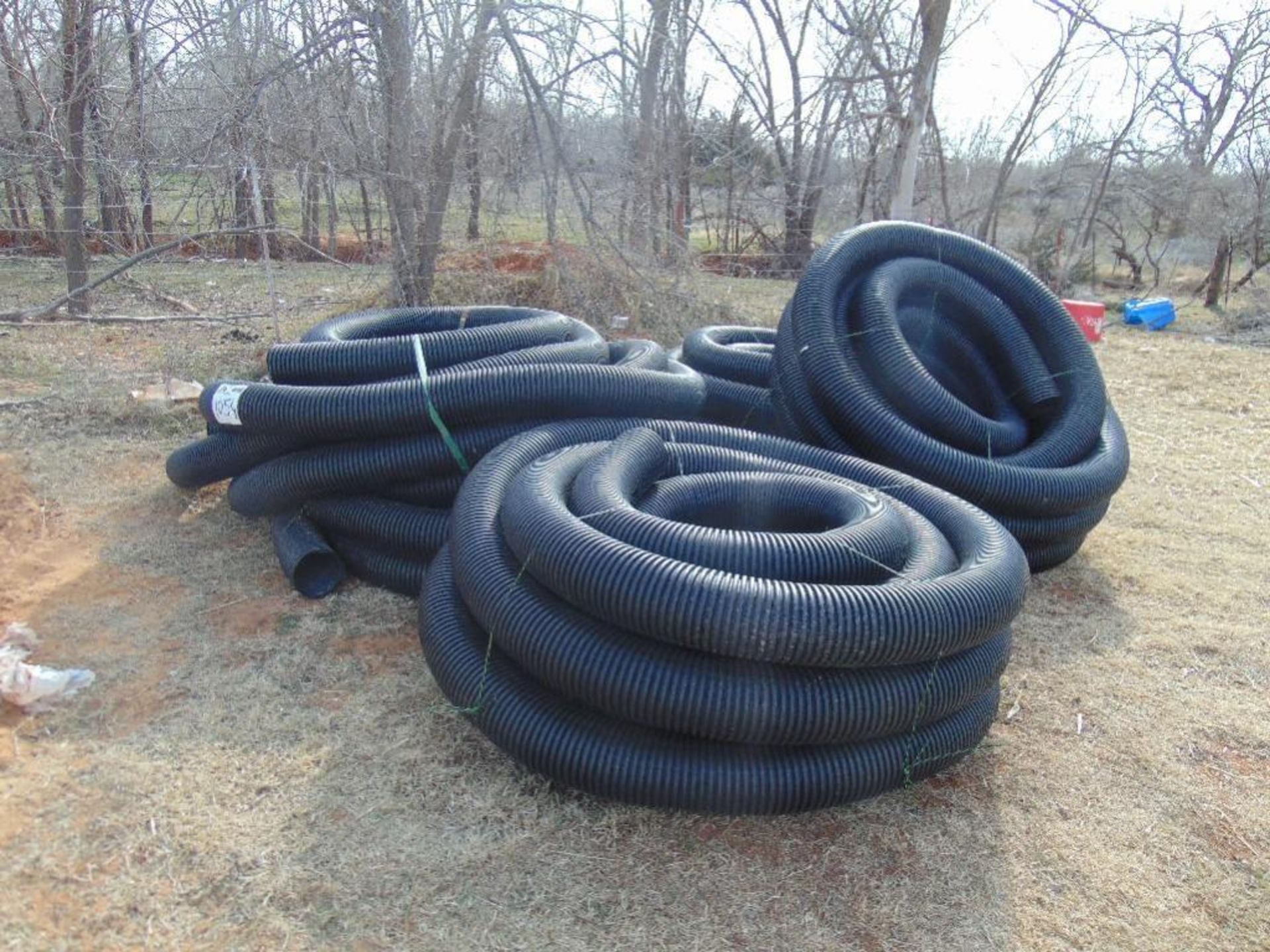 (4) Rolls of black plastic hose