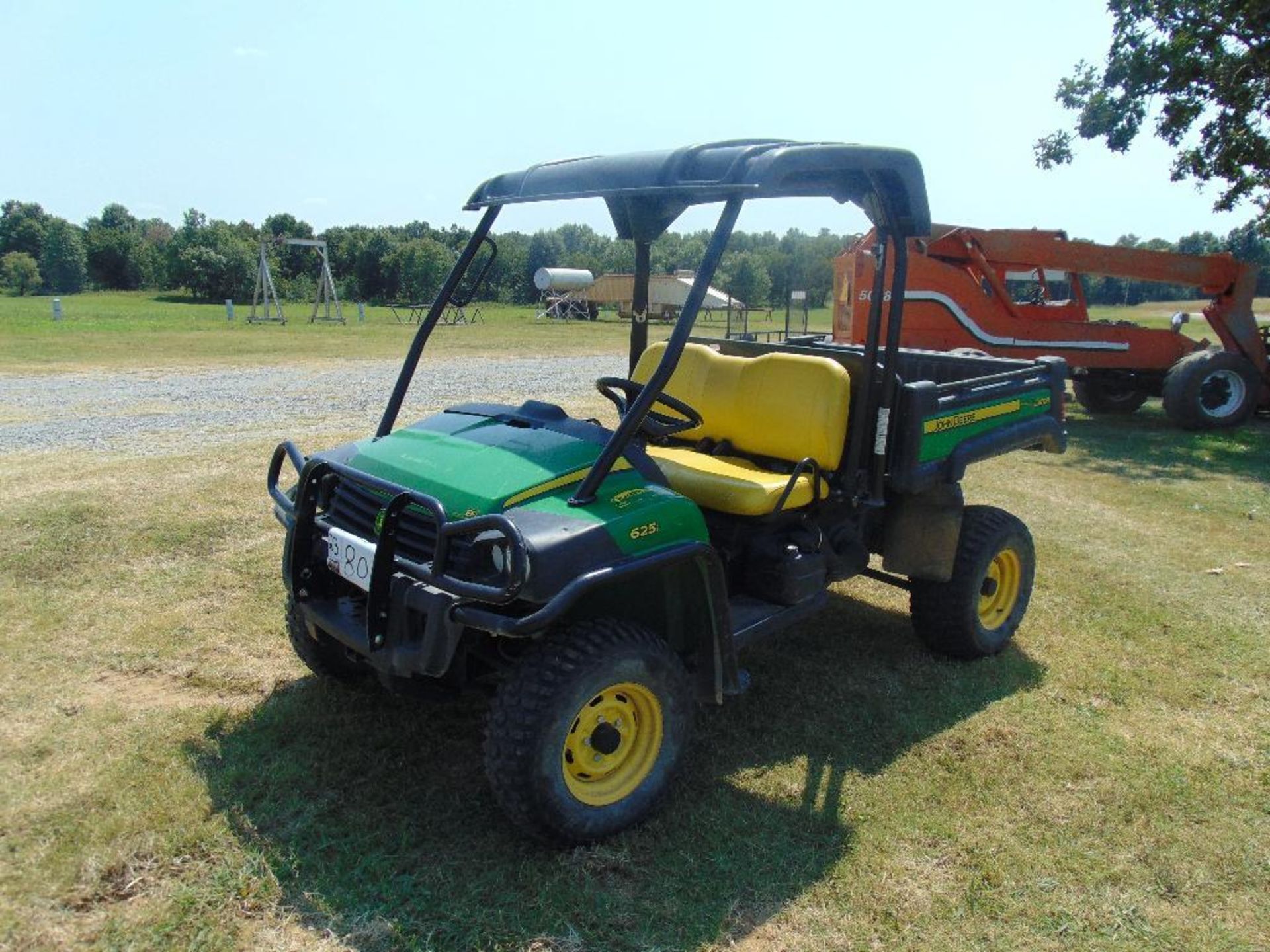 2011 John Deere 625i Gator, s/n 1m0625gsjbm013709, hour meter reads 996 hrs, hydraulic dump bed,