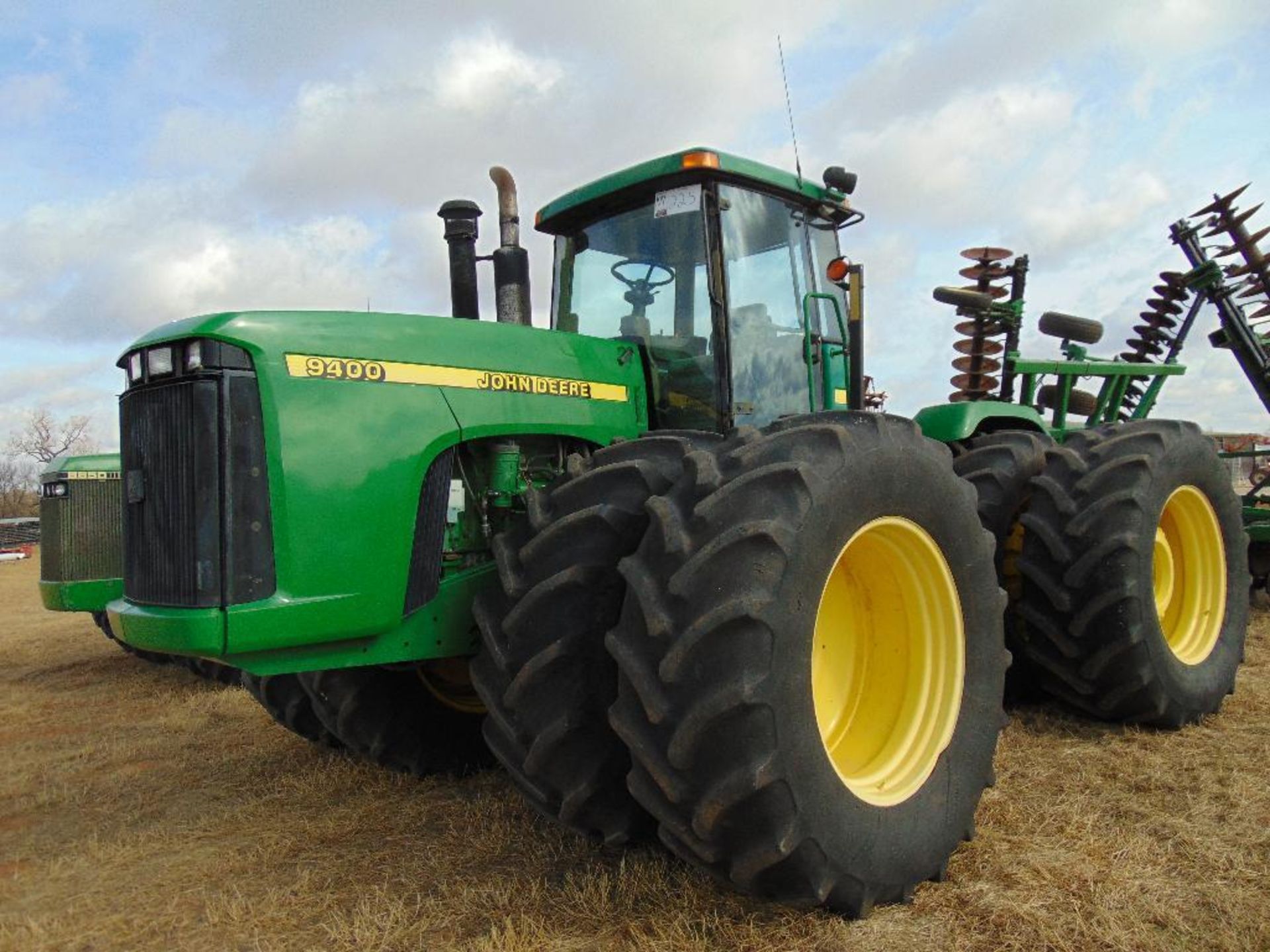 John Deere 9400 4x4 Farm Tractor, s/m p030793, cab, a/c, 4 hyd, duals, hour meter reads 4748 hrs,
