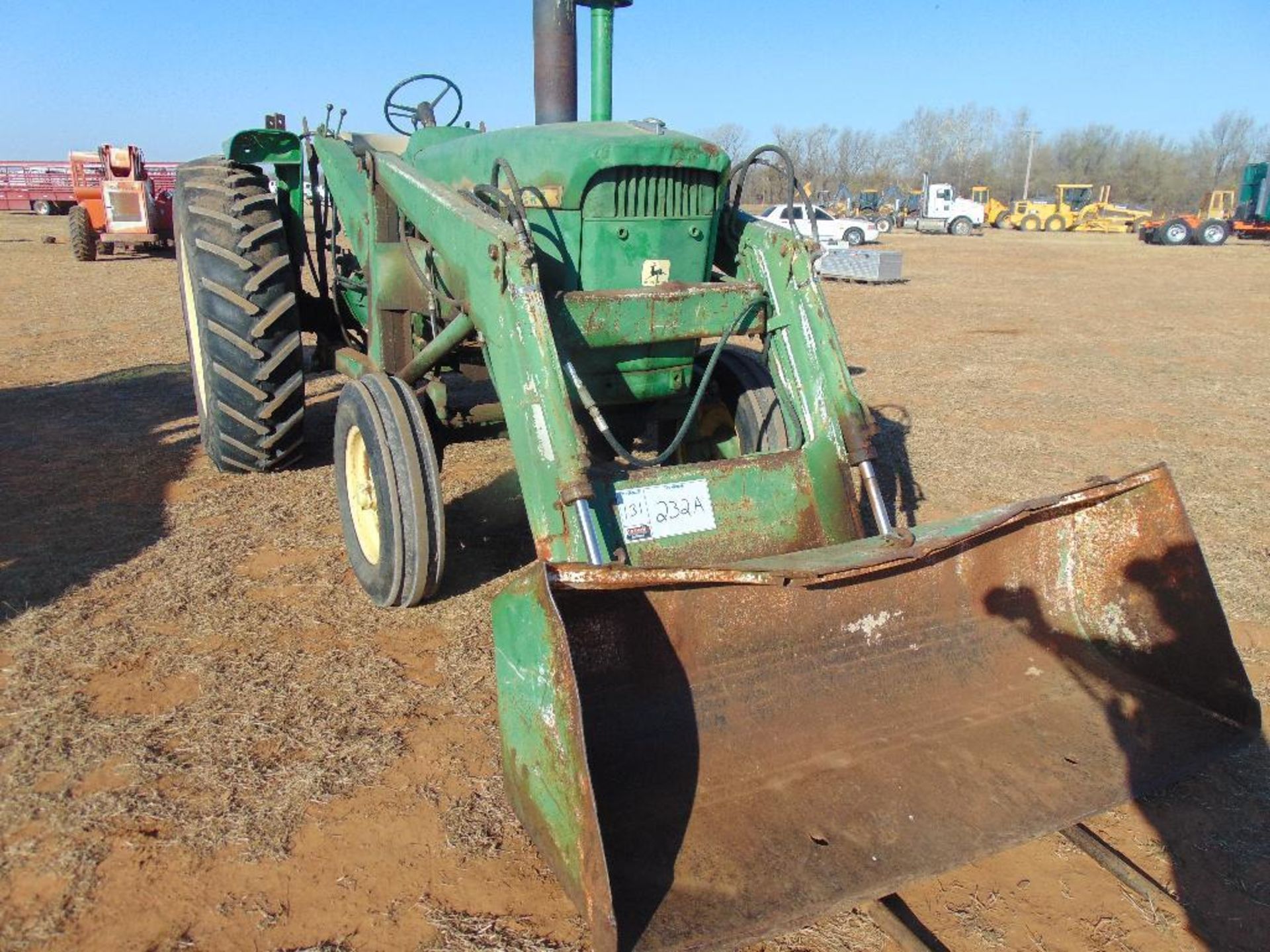 1963 John Deere 4010 Farm Tractor, s/n 21t42997, frontend loader w/spikes & bkt, hour meter reads