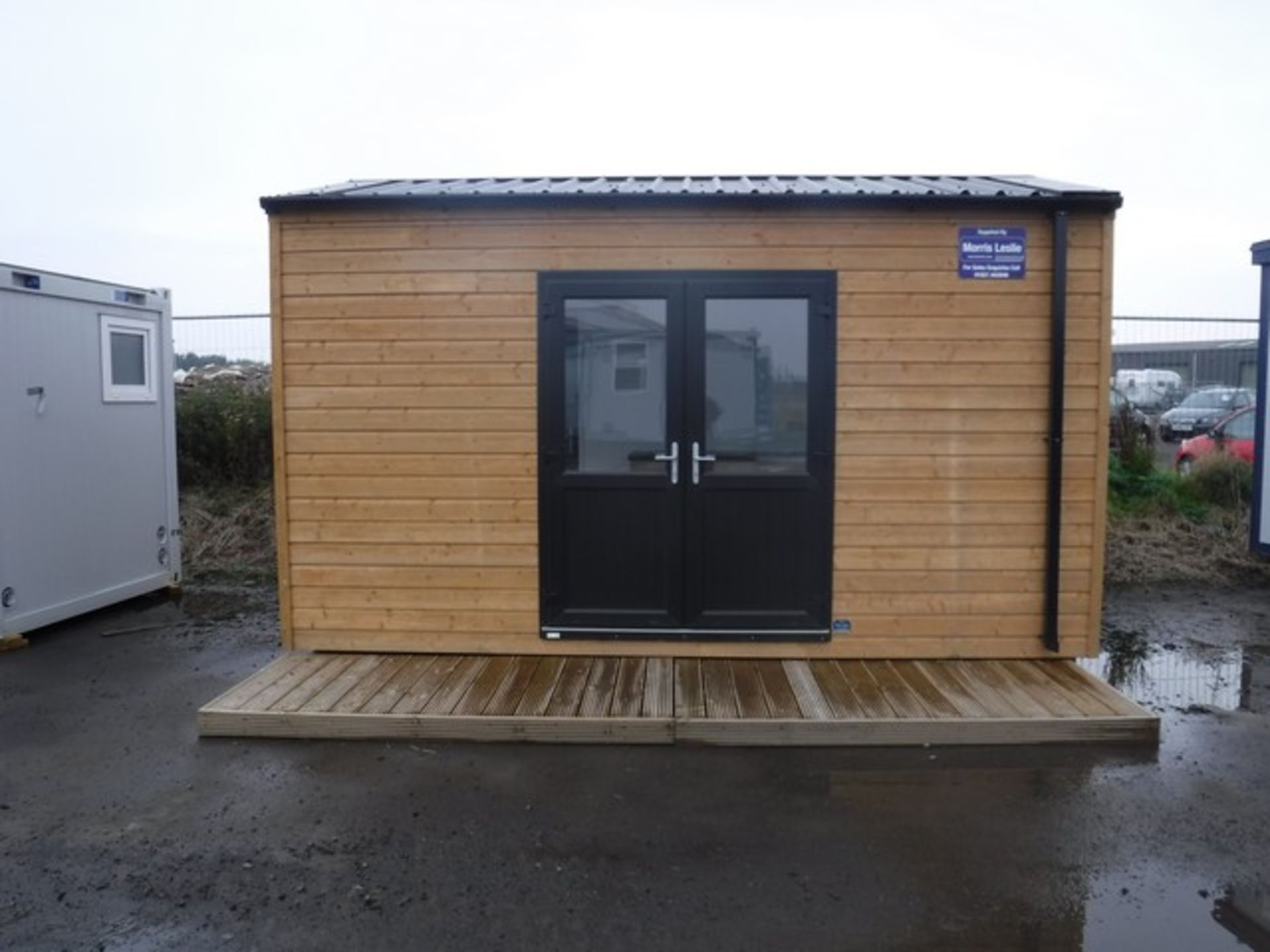 16FT X 10FT EX-DISPLAY TIMBER CLAD CABIN C/W REAR DOOR, FRONT FACING FRENCH DOORS, SINK WITH WORKTOP