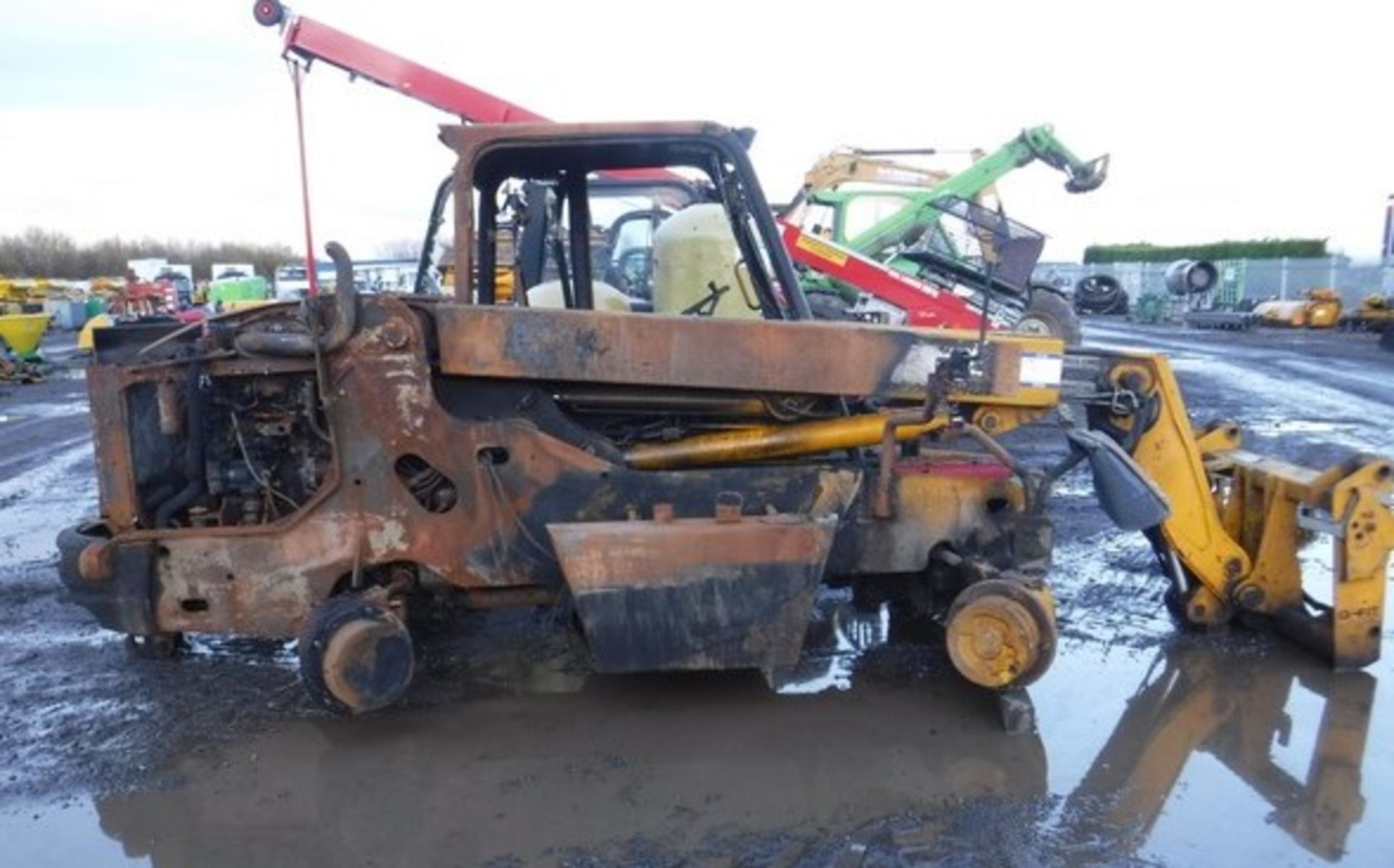 2005 FIRE DAMAGED JCB TELEHANDLER, S/N SLP526555E1150240. MANUFACTURER'S PLATE IN OFFICE.