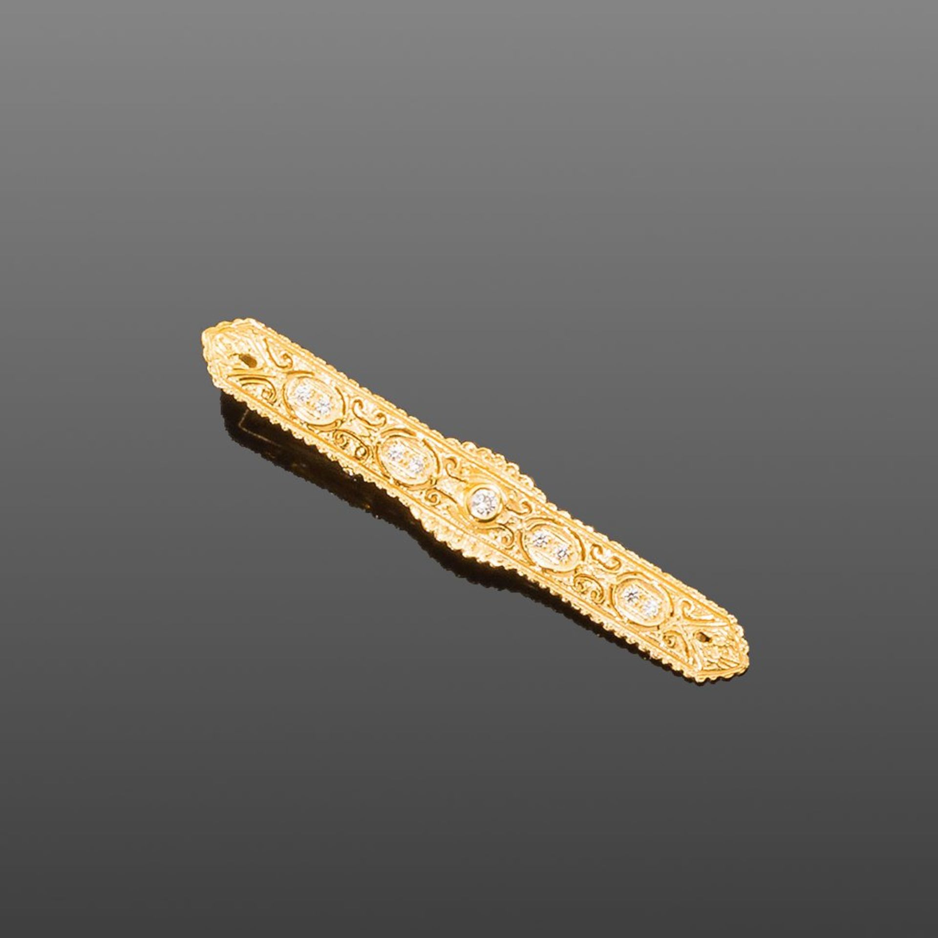 Goldene Krawattenspange. Brillanten ca. 0,22 ct. 14 ct. GG. 12 g. L 6 cm
