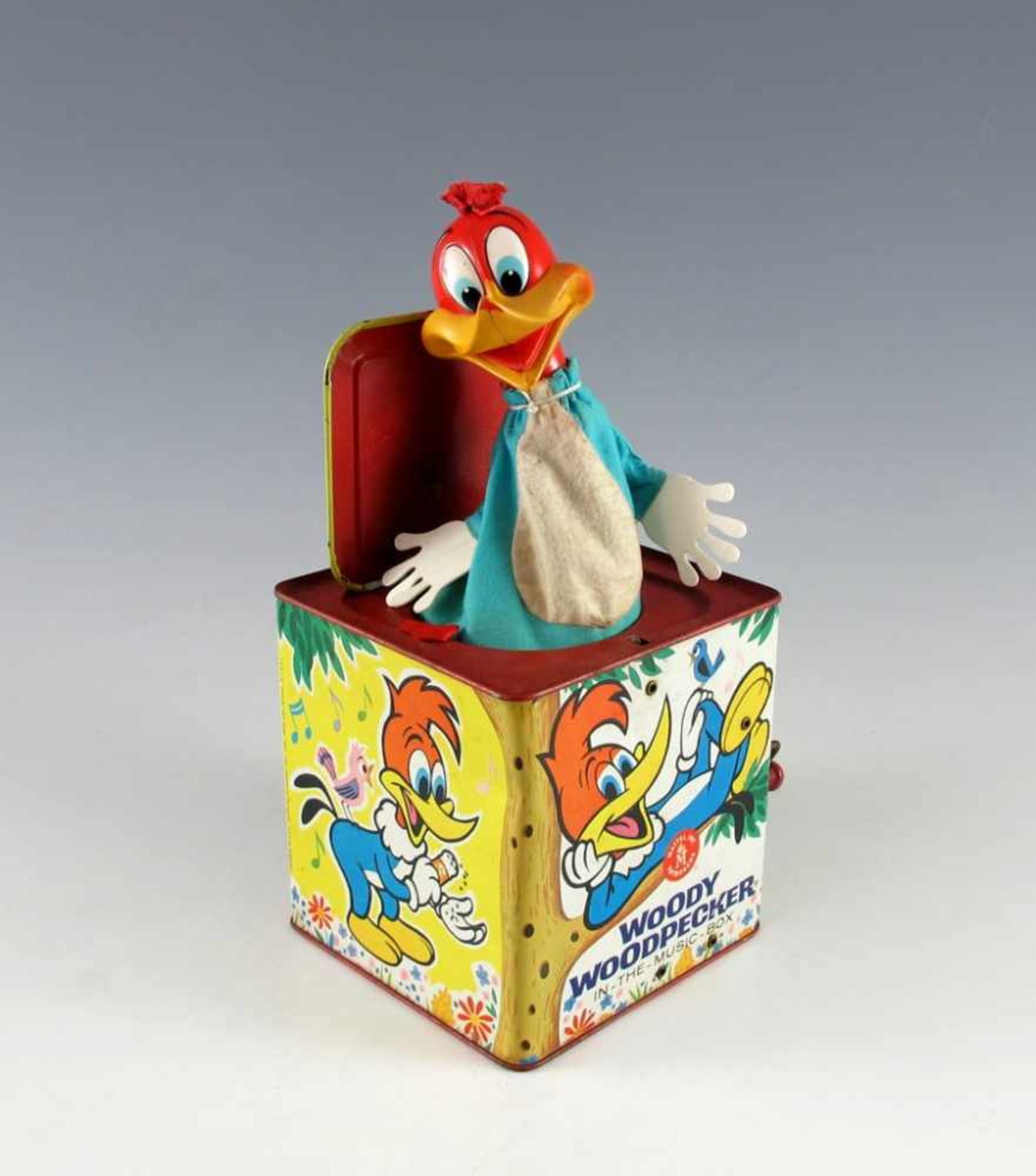 "Woody Woodpecker in the Music Box". Matty Mattel Toymakers, 1960er Jahre. Bemalte Blechdose, 14 x