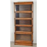 7teiliger Systemschrank/Bücherschrank. Sog. "Lawyers Bookcase". Eiche. Um 1920/30. Alle Glasfelder