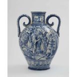 DOPPELHENKELVASE Wohl Oberitalien, Ende 19. Jh./Anfang 20. Jh. Majolika. Balusterform. Blaudekor: