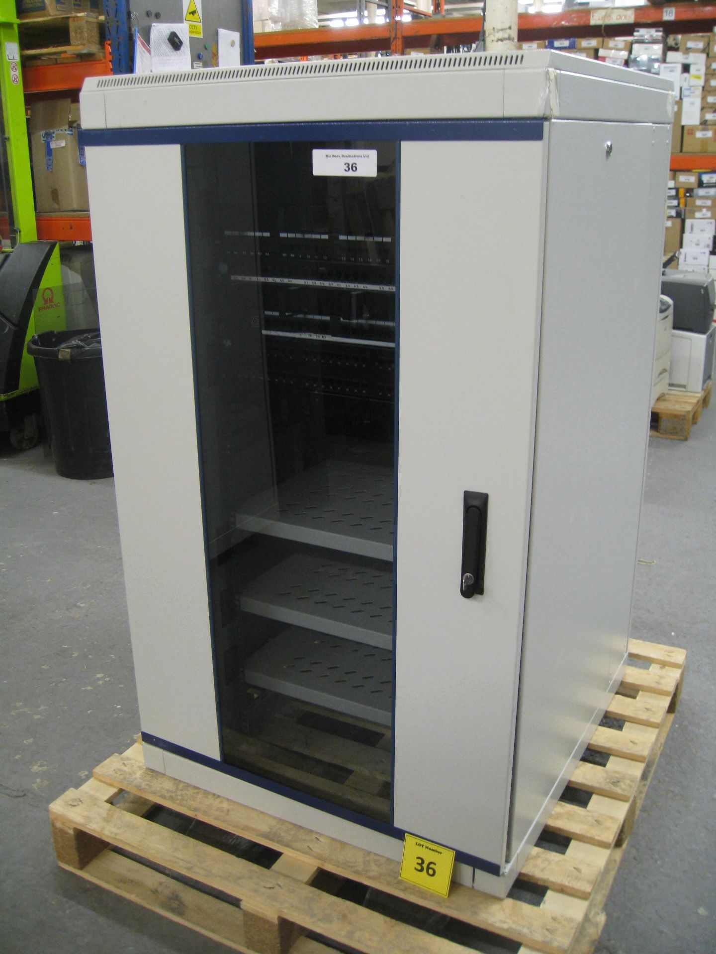 COMMS CABINET. 127CM TALL, 78CM WIDE & 82CM DEEP. WITH 3 SHELVES, 4 X PATCH PANELS AND FAN PANE;L ON