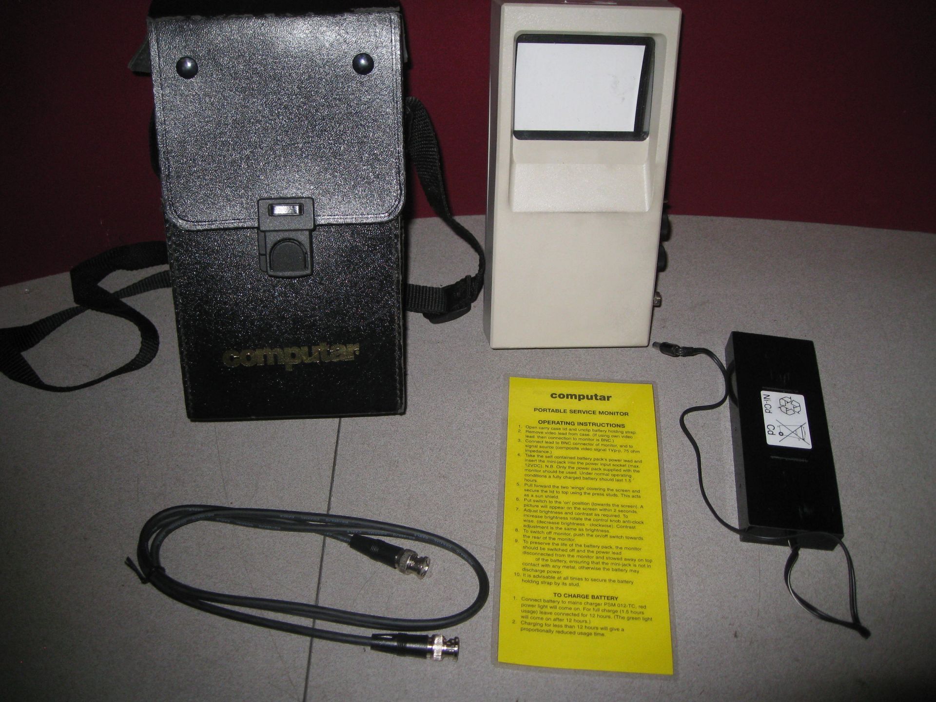 COMPUTAR PORTABLE SERVICE MONITOR IN CARRYCASE WITH CABLE AND RECHARGABLE BATTERY. SEE PHOTO.