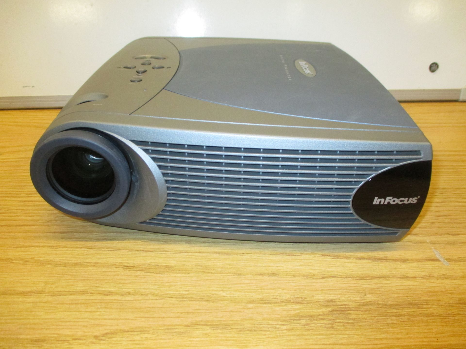 INFOCUS DIGITAL LP 340 PROJECTOR IN CARRY CASE WITH REMOTE CONTROL.