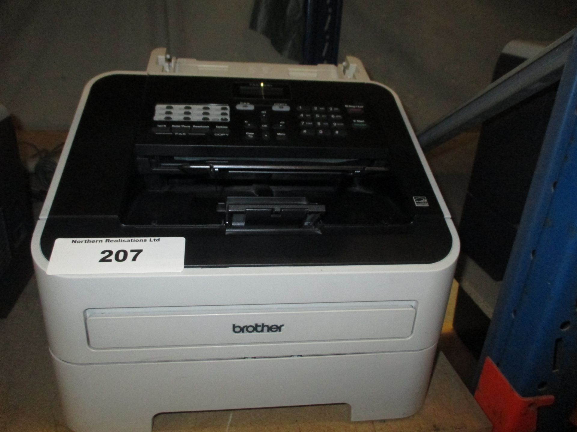 Brother FAX-2840 with test print.