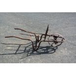 COLLECTABLES - An antique metal turf barrow/ cart,