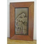 CERAMICS - An antique framed ceramic tile showing