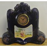 CLOCKS - An antique ceramic cased German mantle cl