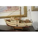 COLLECTABLES - A wooden model ship in the form of