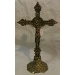 COLLECTABLES - A brass crucifix on stand, measurin