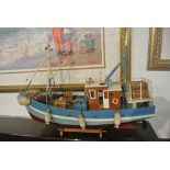 COLLECTABLES - A wooden model ship in the form of