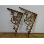 COLLECTABLES - A pair of decorative antique cast m