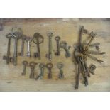 COLLECTABLES - A large collection of antique keys.