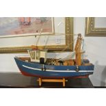 COLLECTABLES - A wooden model ship in the form of