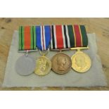 MILITARIA - A group of 4 medals to include an Ulst