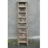 COLLECTABLES - A vintage wooden painters ladder.