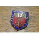 COLLECTABLES - An antique/ vintage enamel pin badge reading 'Portrush Bowling Club 1923'