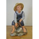 CERAMICS - A Royal Doulton 'Tom Sawyer' figurine,