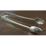 SILVER - A pair of antique sterling silver sugar t