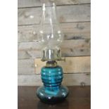 COLLECTABLES - An antique blue 'Ribbed' glass oil