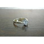 JEWELLERY/ GOLD - A 9ct gold ring with large CZ st