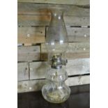 COLLECTABLES - A vintage/ antique clear glass oil