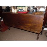 FURNITURE/ HOME - An antique mahogany drop leaf ta