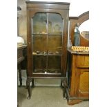 FURNITURE/ HOME - A mahogany display cabinet on de