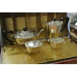 COLLECTABLES - An antique 4 piece silver plated te