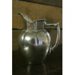 SILVER - A stylish silver milk jug, produced by Hi