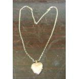 GOLD/ JEWELLERY - A 9ct gold heart shaped locket &