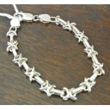 SILVER/ JEWELLERY - A sterling silver fancy link b