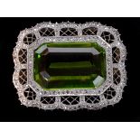 An antique belle epoque peridot, platinum and rose cut diamond brooch, c1905, possibly Russian,