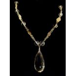 An antique citrine and yellow metal necklace, composed of ten slightly graduated faceted citrine